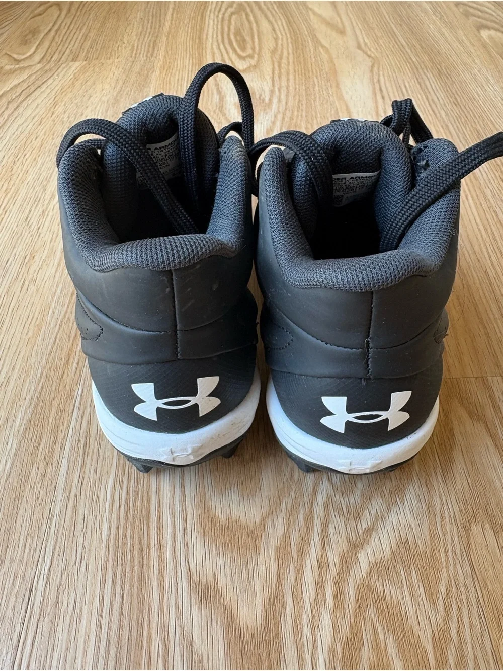 Under Armour Kids' Black Athletic Cleats size 11 kids